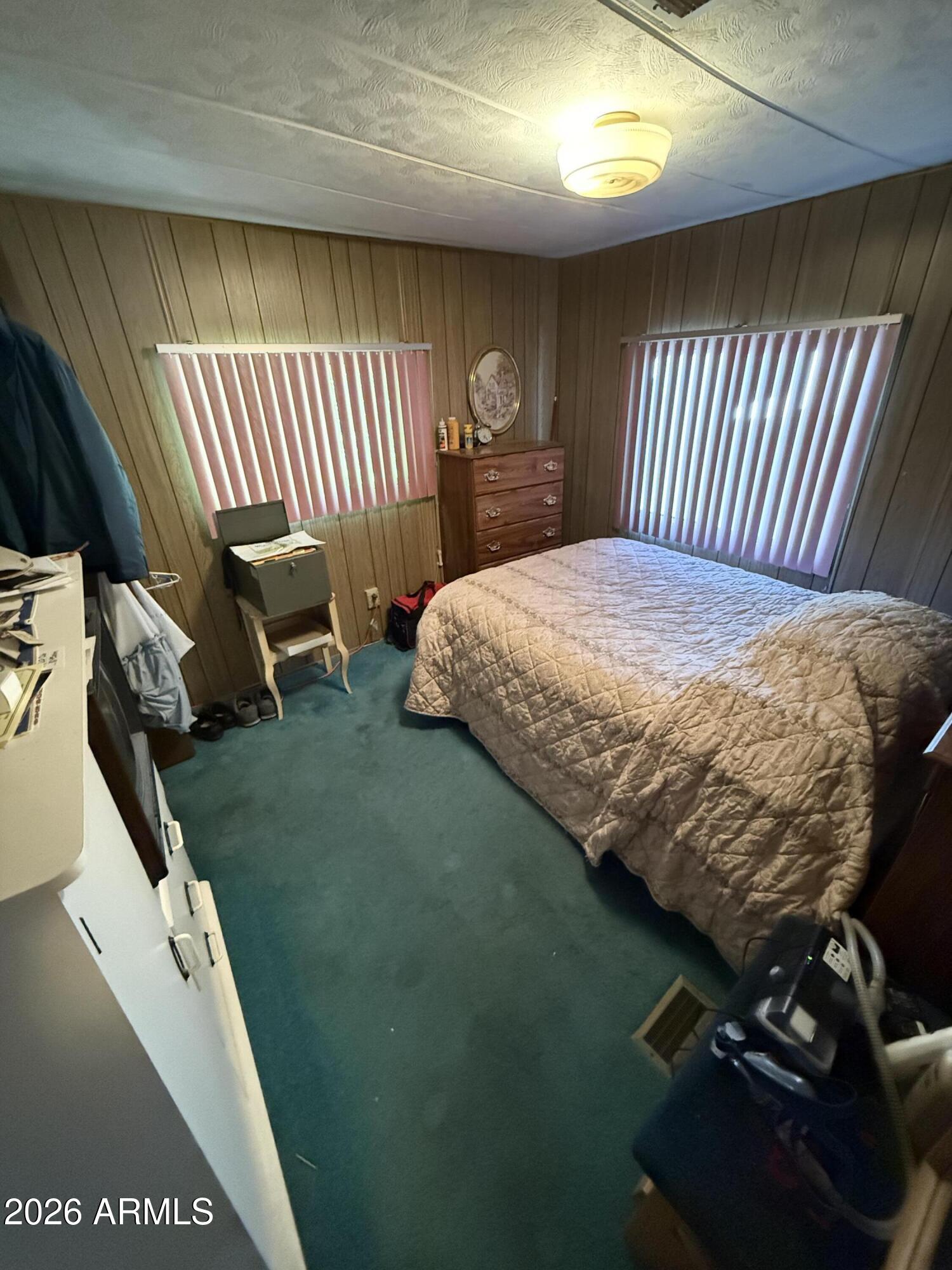 9501 East Broadway Road, Unit 164 Mesa, AZ 85208 - Photo 17 of 27 a bedroom with a bed and a large window