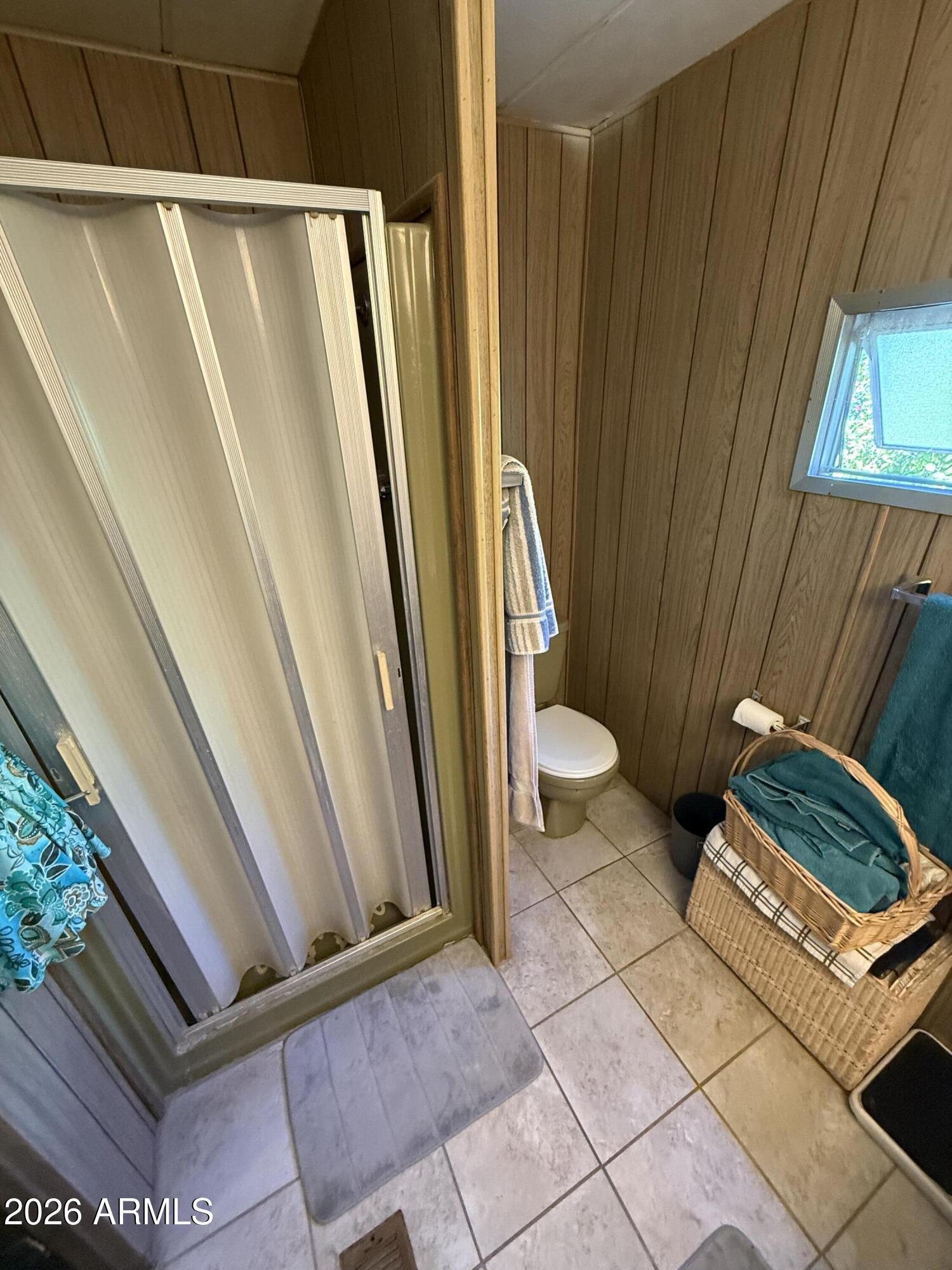 9501 East Broadway Road, Unit 164 Mesa, AZ 85208 - Photo 18 of 27 a bathroom with a sink and toilet