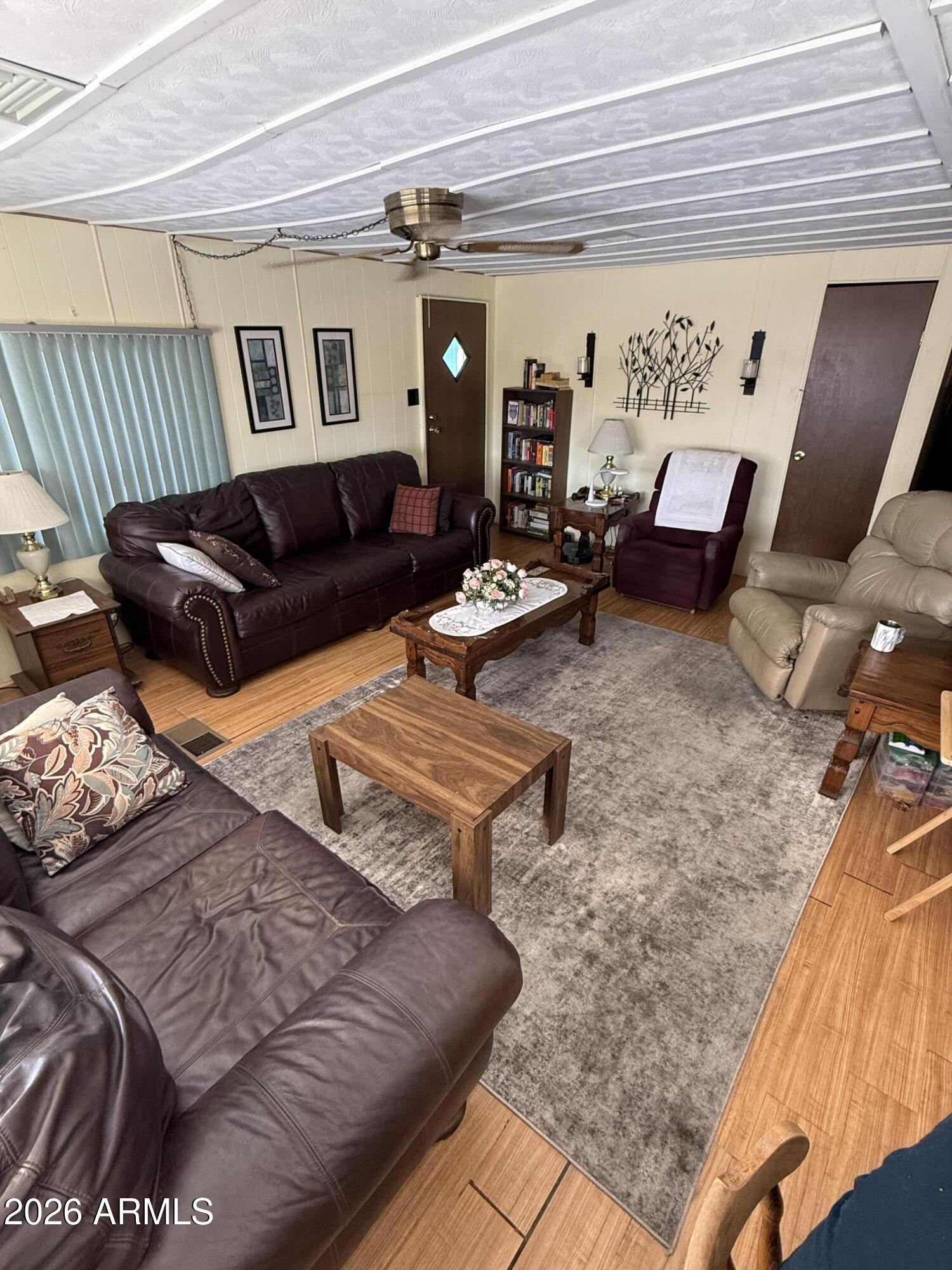 9501 East Broadway Road, Unit 164 Mesa, AZ 85208 - Photo 8 of 27 a living room with furniture