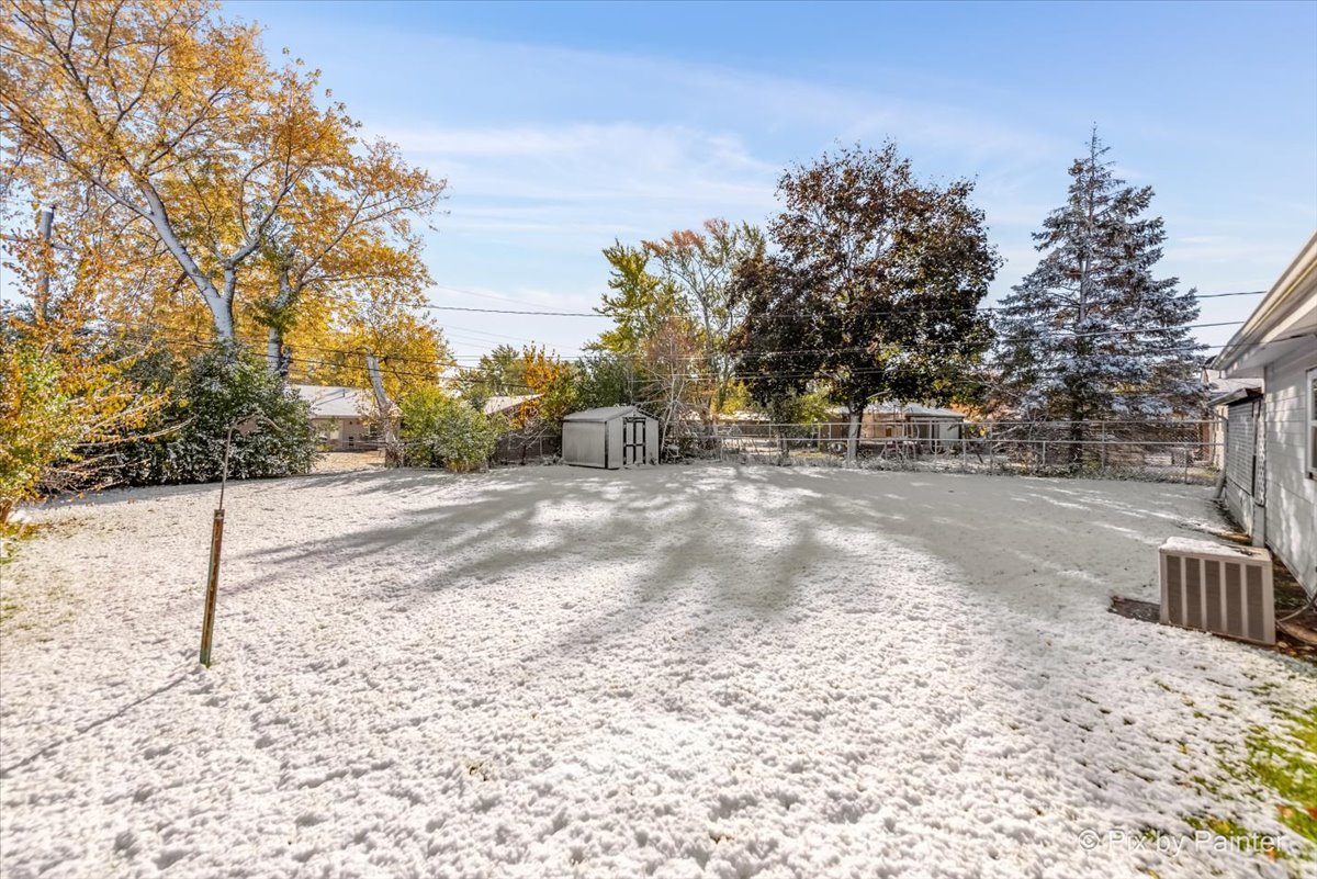 195 Washington Boulevard Hoffman Estates, IL 60169 - Photo 19 of 26 a view of dirt yard with a large tree