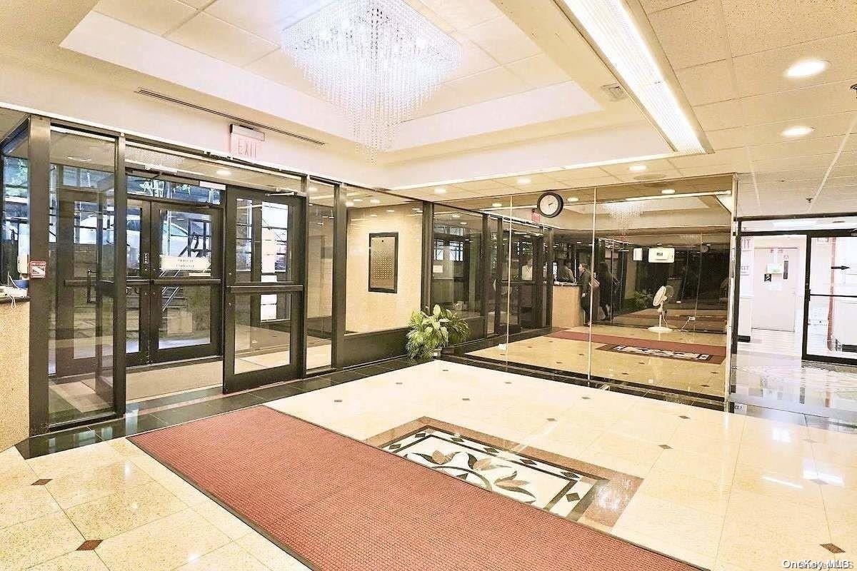 92-29 Queens Boulevard, Unit 9D Queens, NY 11374 - Photo 3 of 13 a large swimming pool and outdoor seating