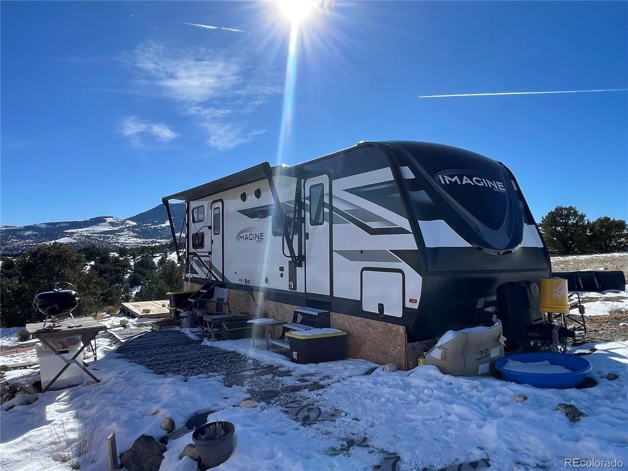 760 County Road East Del Norte, CO 81132 - Photo 9 of 20 a view of a house with a patio