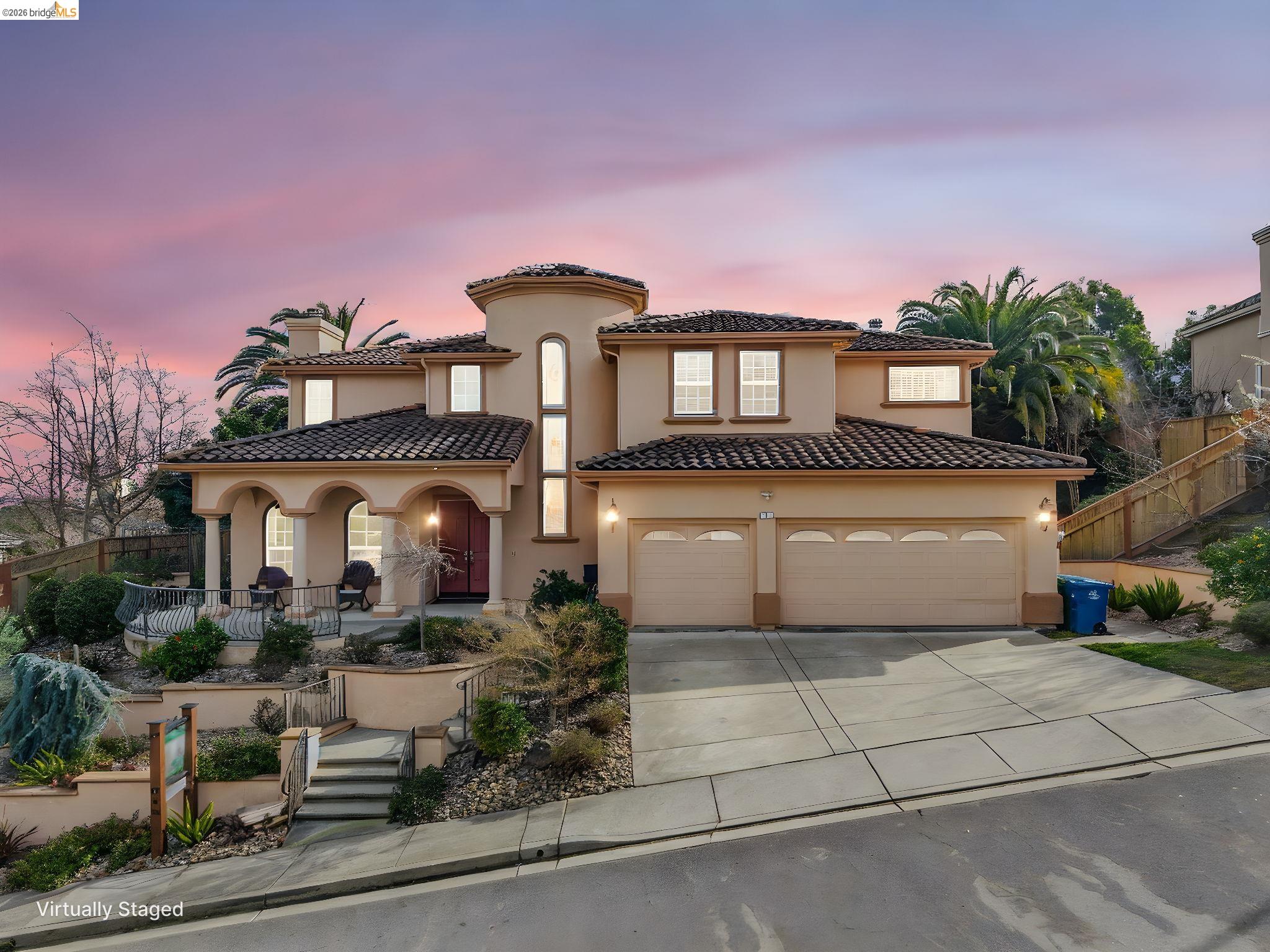 5 Circle E Ranch Place San Ramon, CA 94583 - Photo 1 of 1 Mediterranean / spanish-style house featuring driveway, stucco siding, an attached garage, covered porch, and a tile roof
