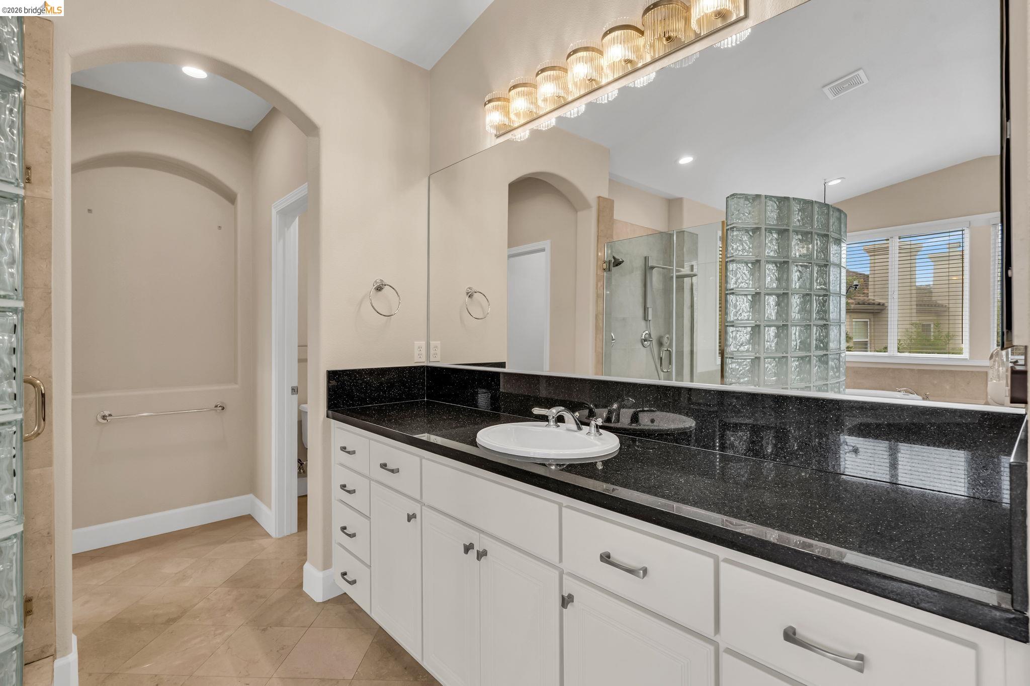 5 Circle E Ranch Place San Ramon, CA 94583 - Photo 21 of 60 Full bath featuring a bath, a shower stall, vanity, and recessed lighting