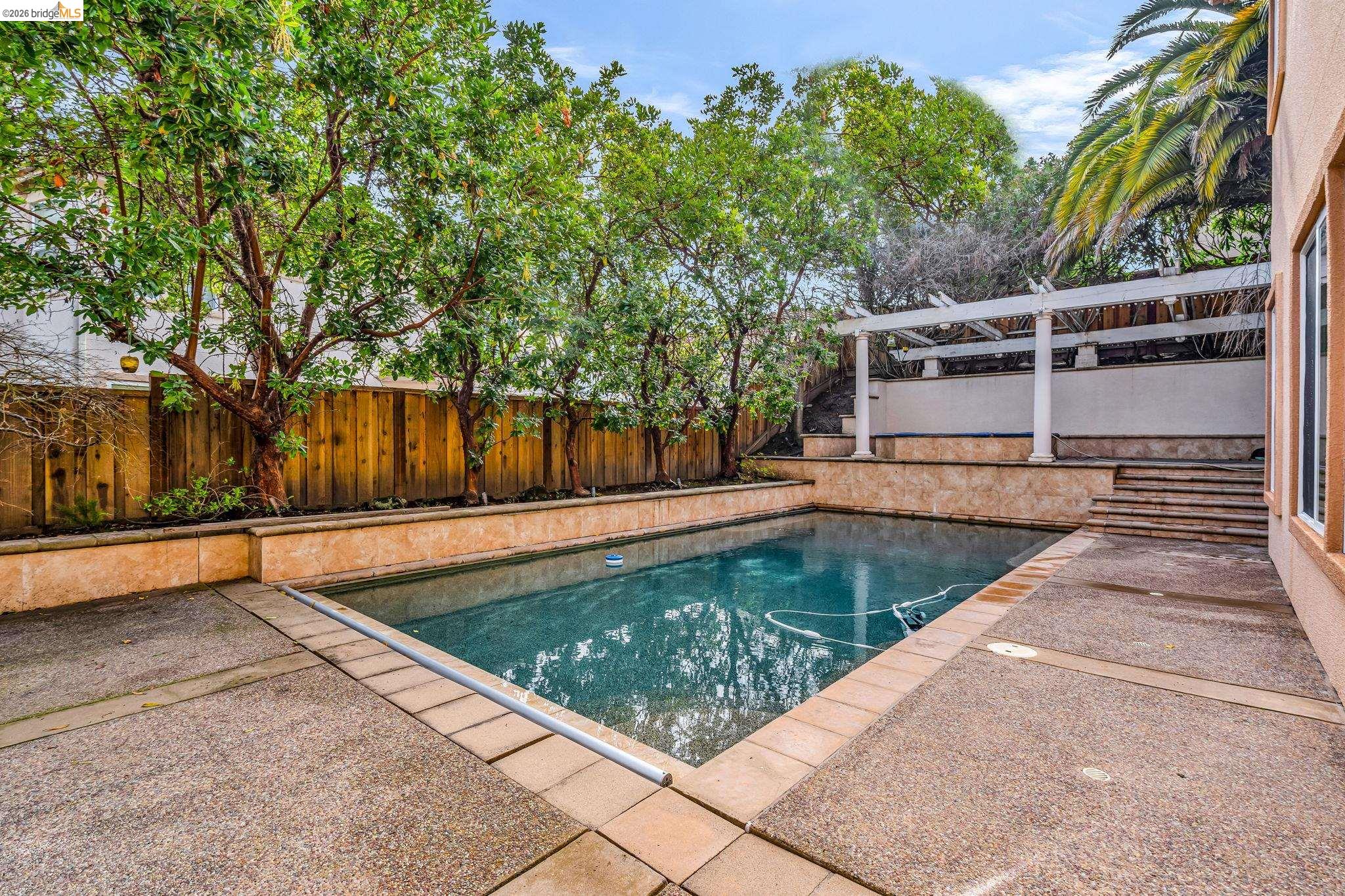 5 Circle E Ranch Place San Ramon, CA 94583 - Photo 27 of 60 View of pool featuring patio surround and a fenced backyard