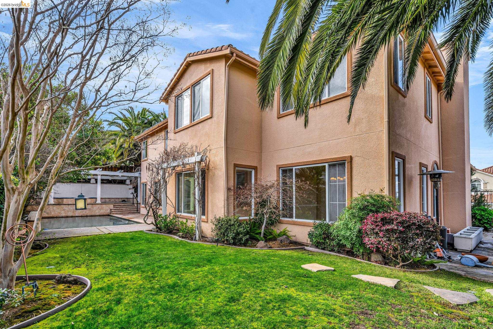 5 Circle E Ranch Place San Ramon, CA 94583 - Photo 31 of 60 a view of a house with a yard and plants