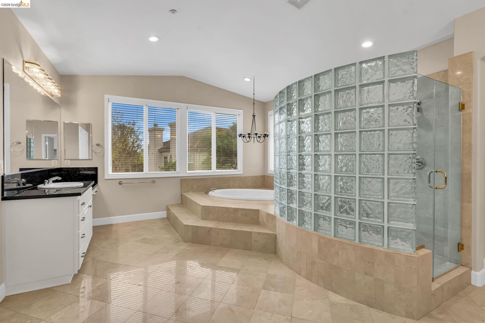 5 Circle E Ranch Place San Ramon, CA 94583 - Photo 45 of 60 Full bath with a shower stall, vanity, a bath, hanging lights, and lofted ceiling