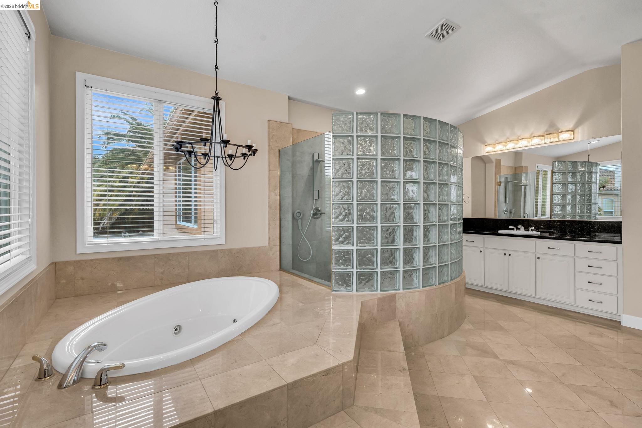 5 Circle E Ranch Place San Ramon, CA 94583 - Photo 46 of 60 Full bath featuring a jetted tub, vanity, walk in shower, plenty of natural light, and recessed lighting