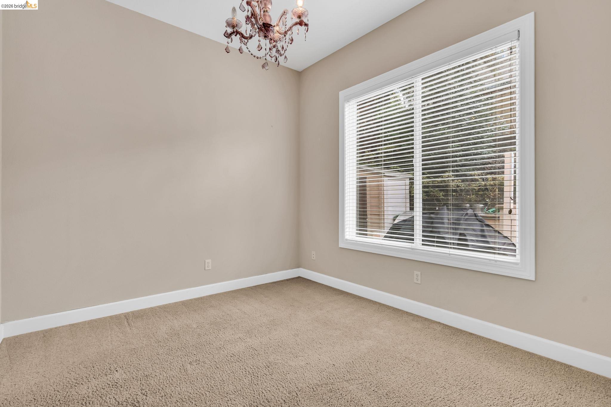 5 Circle E Ranch Place San Ramon, CA 94583 - Photo 56 of 60 Spare room featuring carpet and suspended lighting
