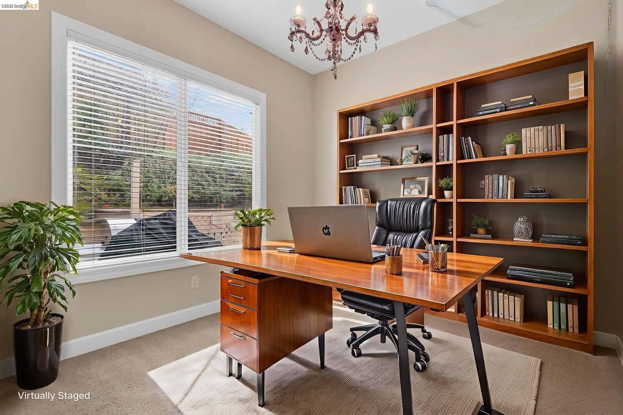 5 Circle E Ranch Place San Ramon, CA 94583 - Photo 57 of 60 a view of a workspace with furniture and a bookshelf