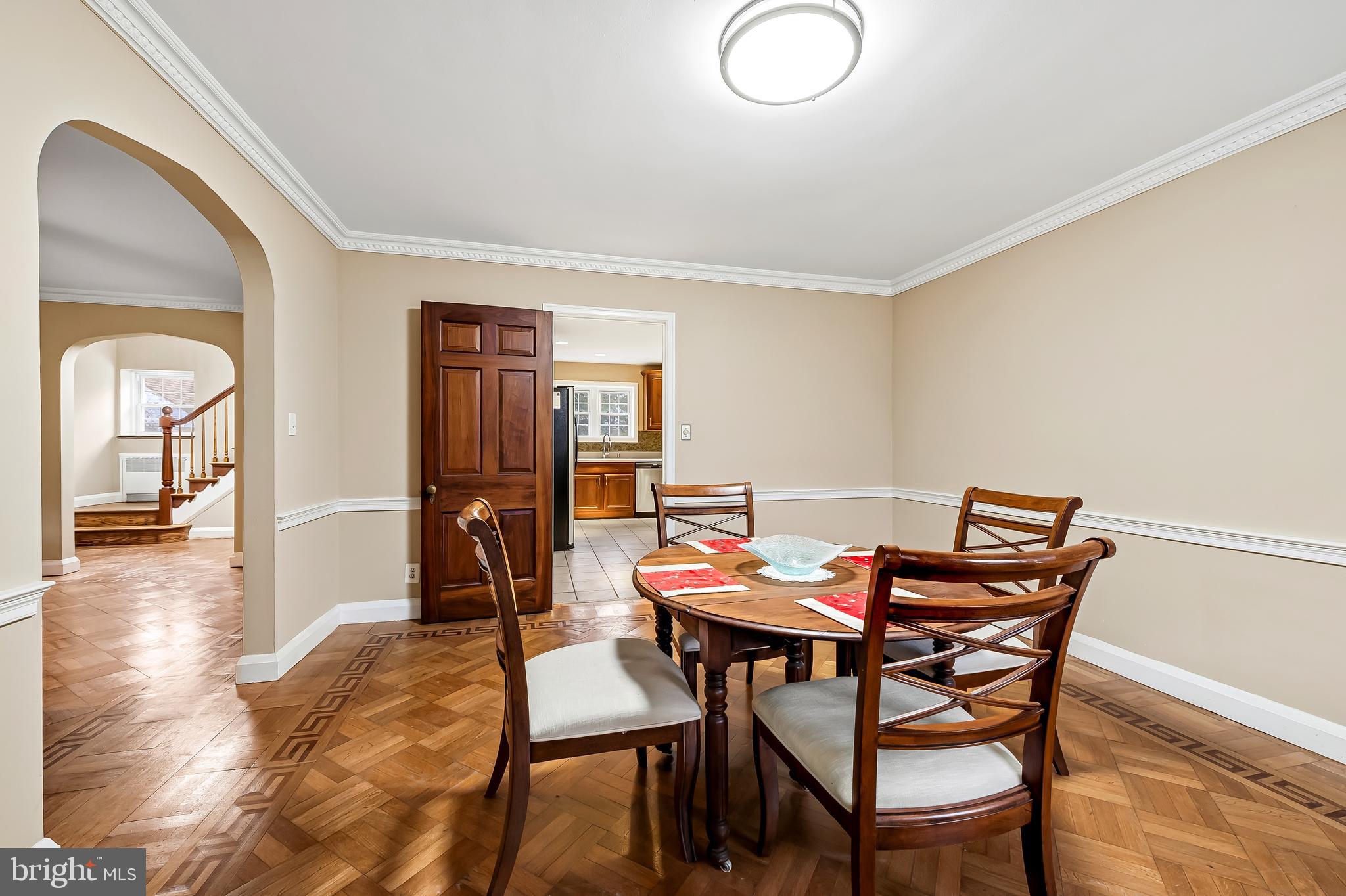 922 Fairway Drive Towson, MD 21286 - Photo 11 of 52 a view of a dining room with furniture and wooden floor