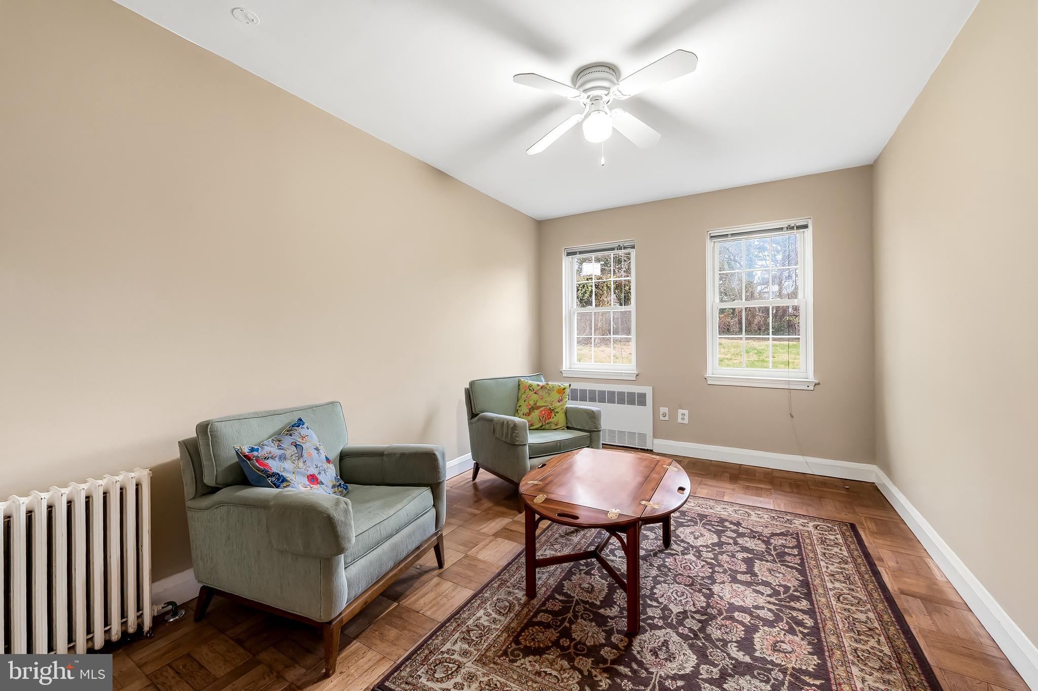 922 Fairway Drive Towson, MD 21286 - Photo 20 of 52 a living room with furniture and a window