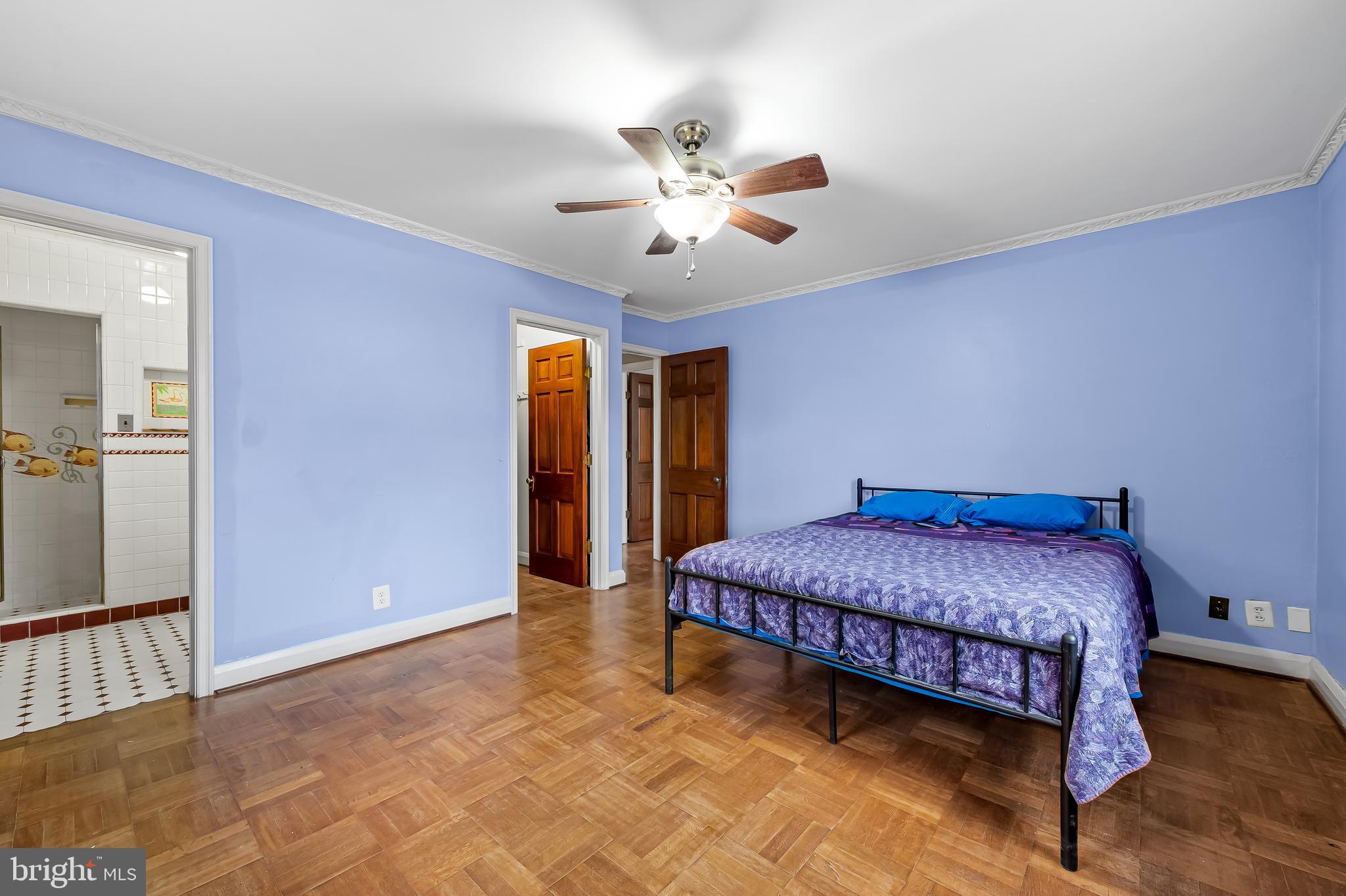 922 Fairway Drive Towson, MD 21286 - Photo 25 of 52 a bed room with a bed and a ceiling fan