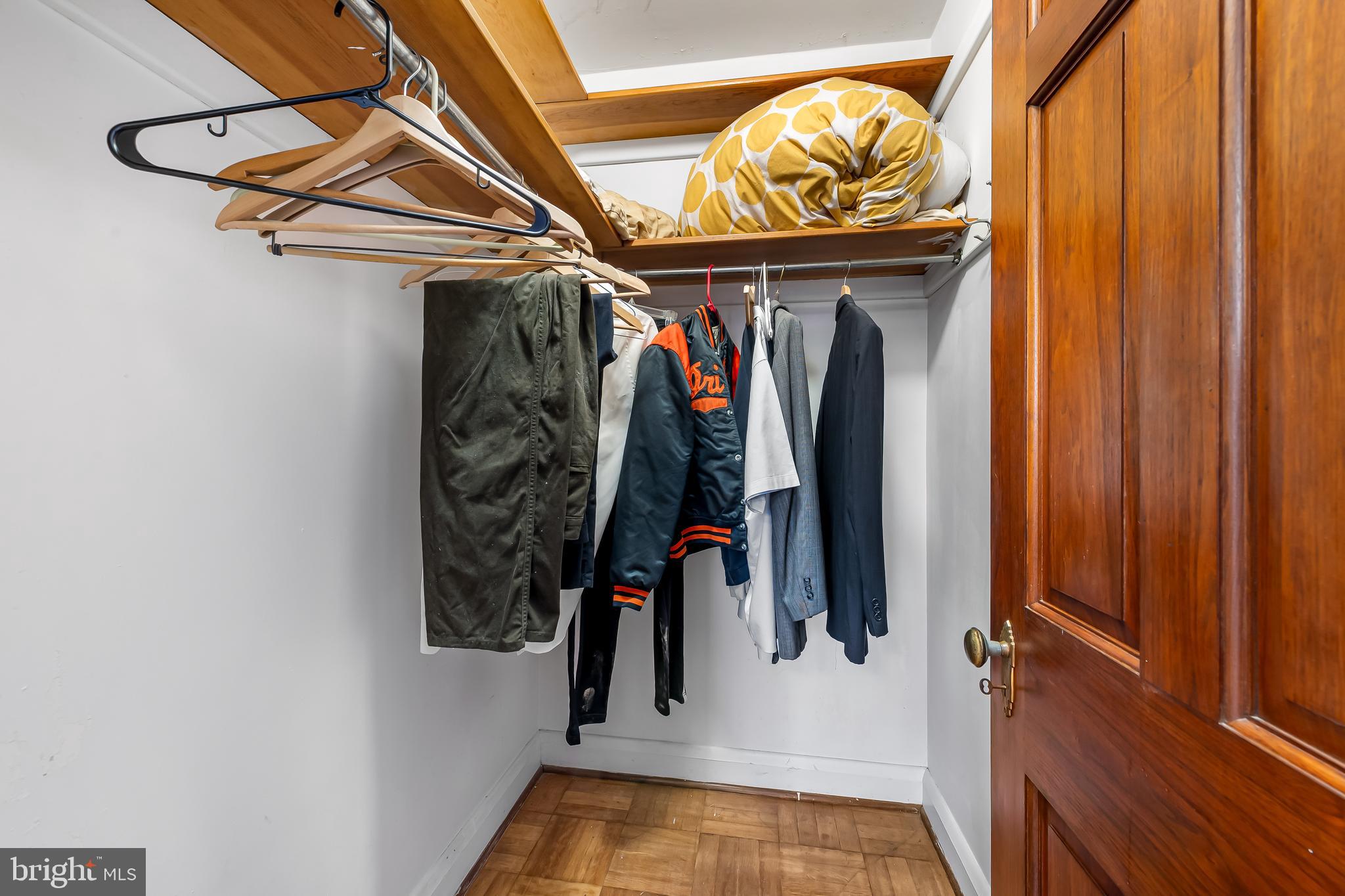 922 Fairway Drive Towson, MD 21286 - Photo 26 of 52 a view of walk in closet with clothes and shoes