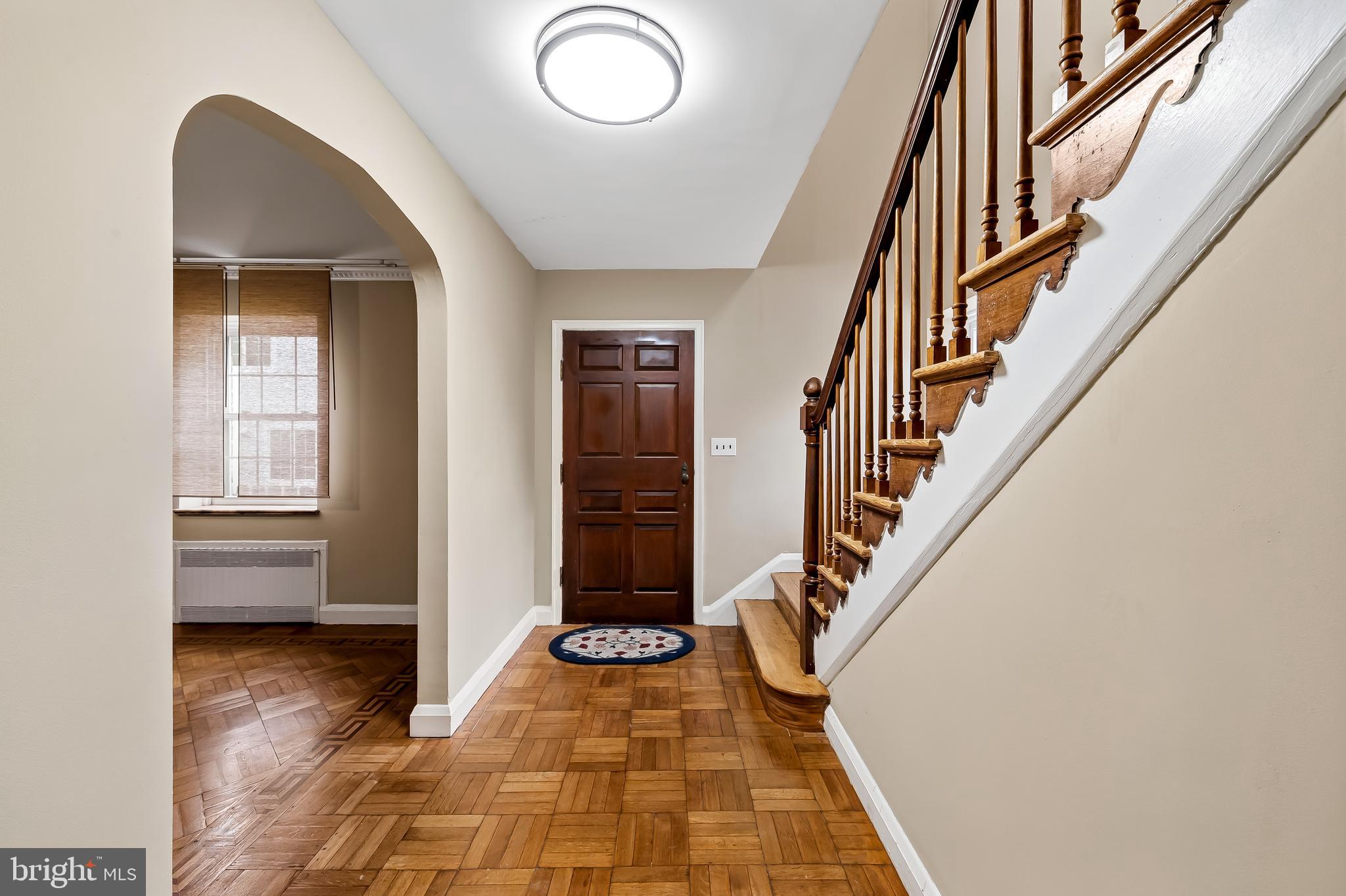922 Fairway Drive Towson, MD 21286 - Photo 7 of 52 a view of an entryway with wooden floor and stairs