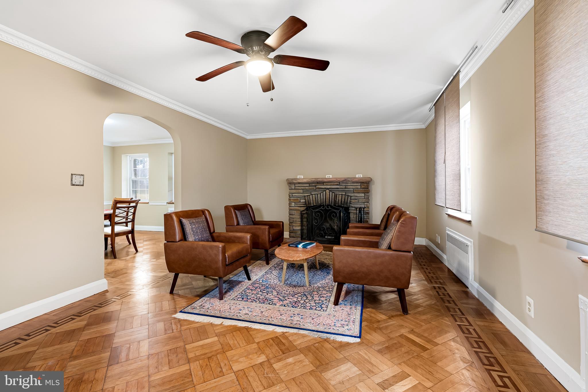 922 Fairway Drive Towson, MD 21286 - Photo 9 of 52 a living room with furniture a fireplace and a window