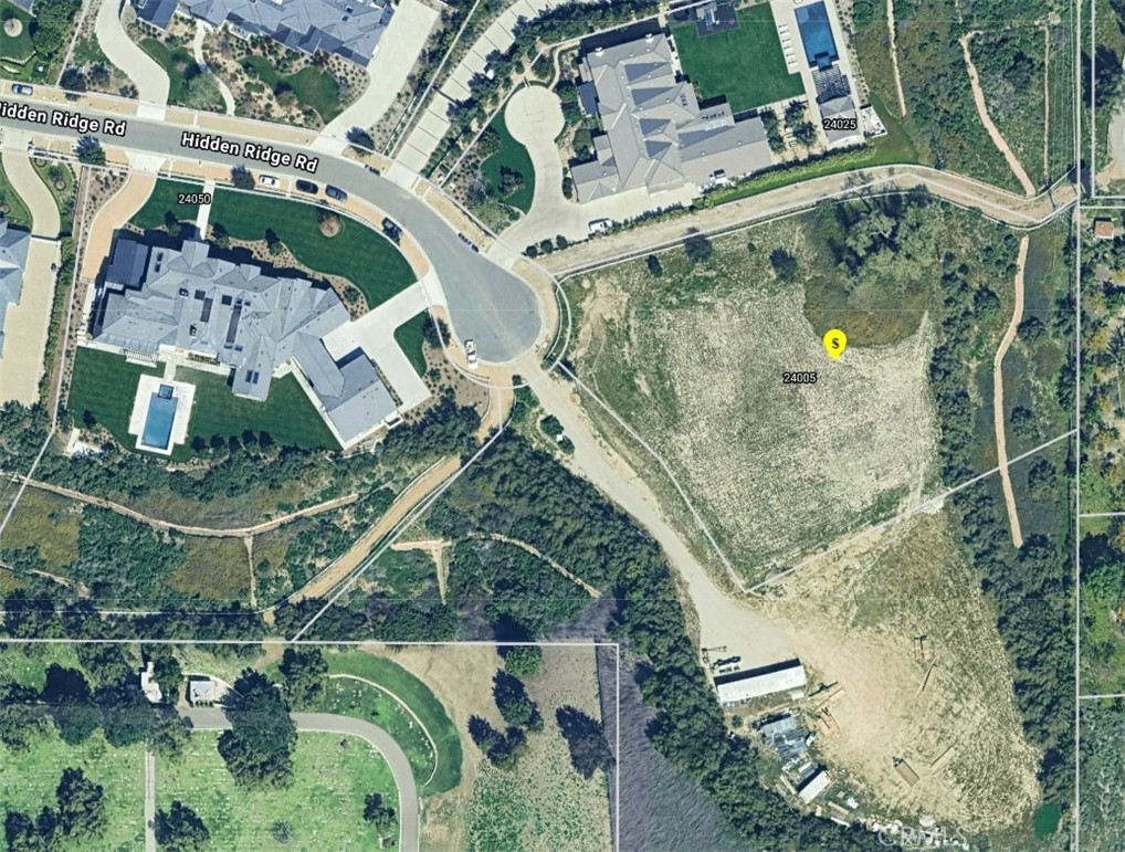 24005 Hidden Ridge Road Hidden Hills, CA 91302 - Photo 6 of 7 an aerial view of a house with a yard