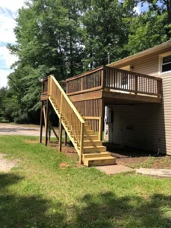 a view of stairs and yard