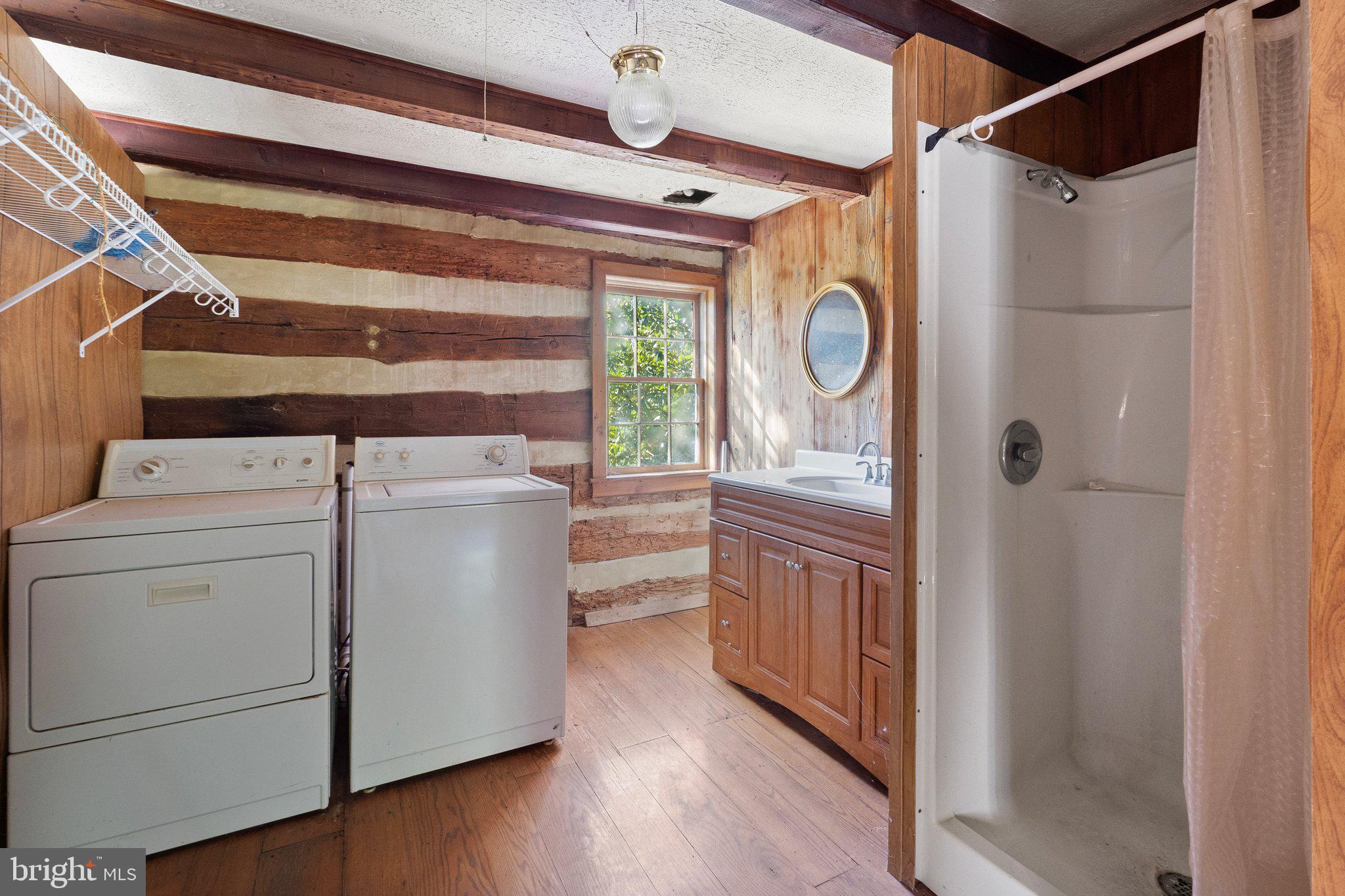 841 Shady Creek Road Clear Brook, VA 22624 - Photo 14 of 62 a utility room with dryer and washer