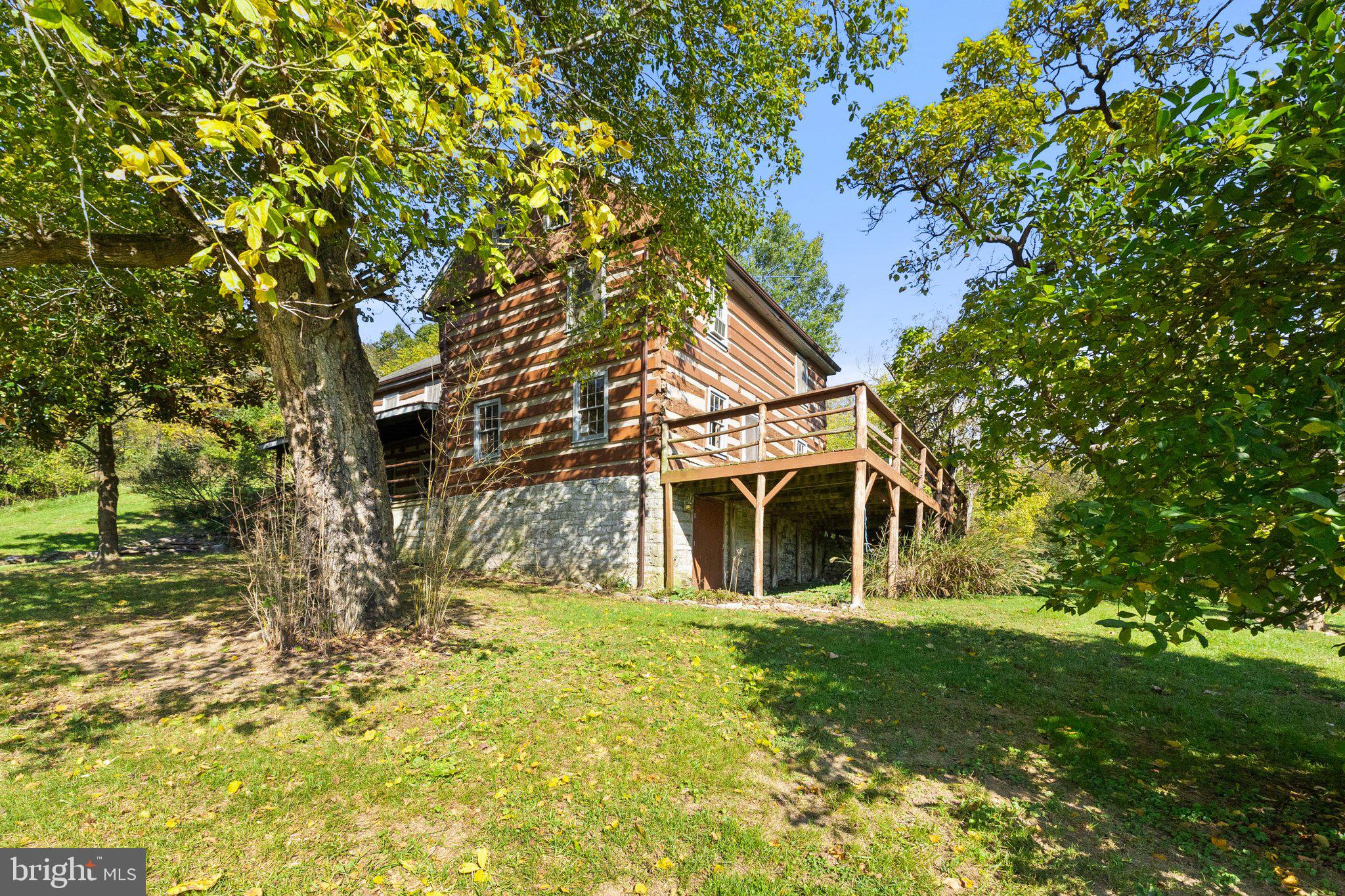 841 Shady Creek Road Clear Brook, VA 22624 - Photo 33 of 62 a view of a house with a yard