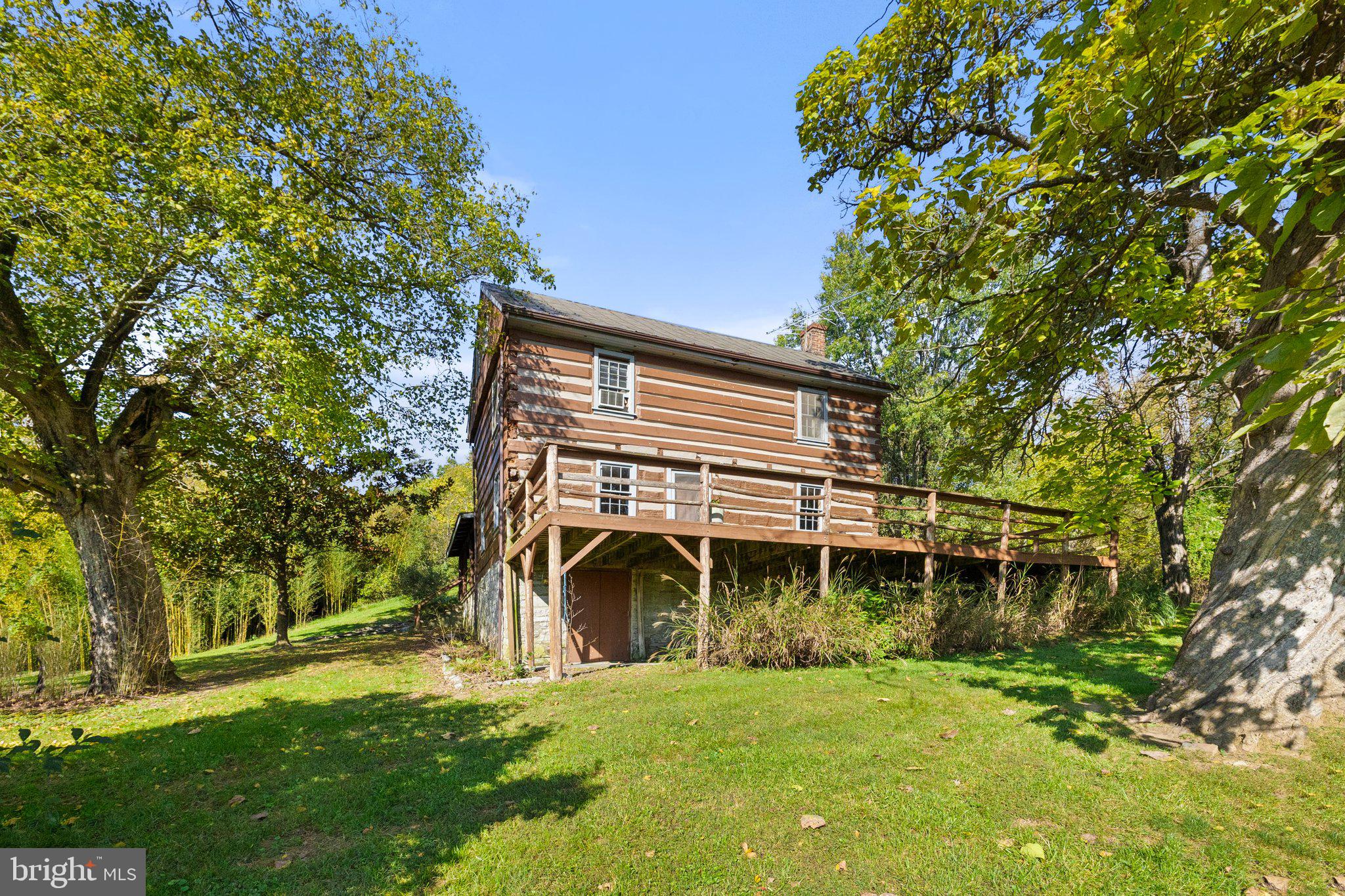 841 Shady Creek Road Clear Brook, VA 22624 - Photo 34 of 62 a front view of a house with a garden