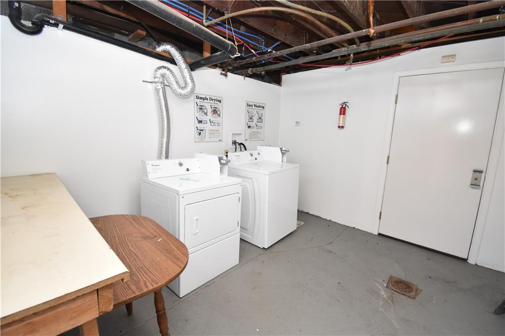 926 Island Avenue McKees Rocks, PA 15136 - Photo 3 of 21 a utility room with dryer and washer
