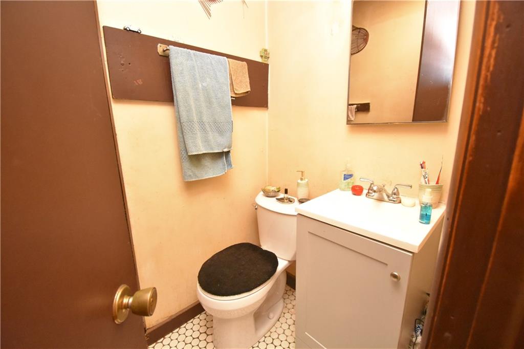 926 Island Avenue McKees Rocks, PA 15136 - Photo 8 of 21 a bathroom with a sink and a toilet