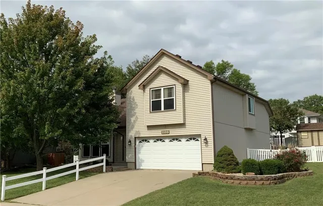 $395,000 | 208 Pacific Court, Raymore, MO 64083