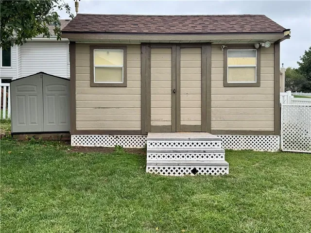 $395,000 | 208 Pacific Court, Raymore, MO 64083