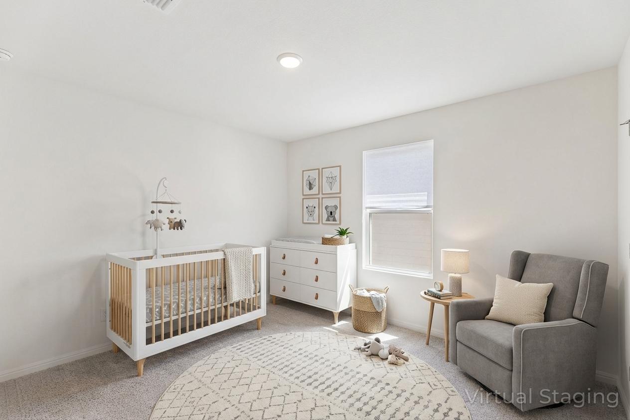 550 Thistle Lane Maxwell, TX 78656 - Photo 23 of 29 Bedroom featuring a crib and light carpet