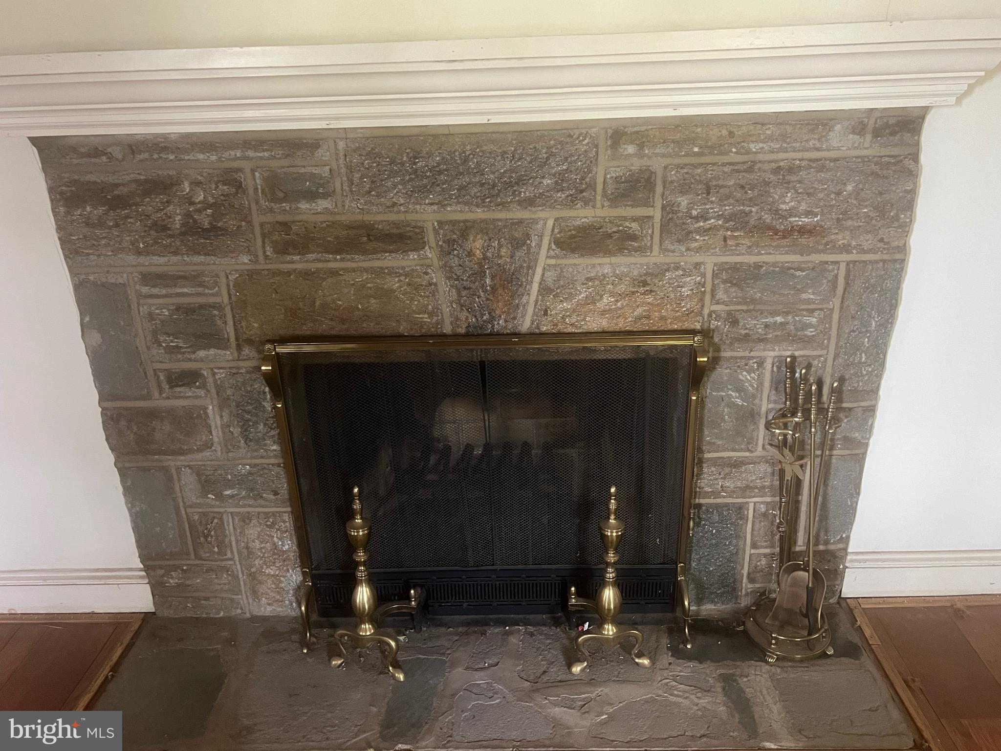 1623 Huntingdon Road Abington, PA 19001 - Photo 7 of 42 stone fireplace in formal living room
