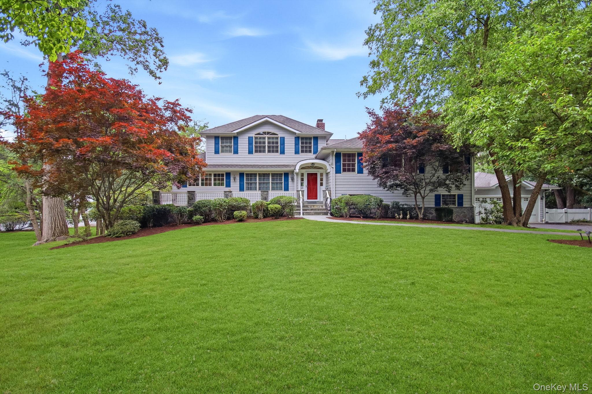 Welcome to 26 Century Ridge Road where timeless charm, spacious living, and exceptional outdoor spaces come together on a private acre