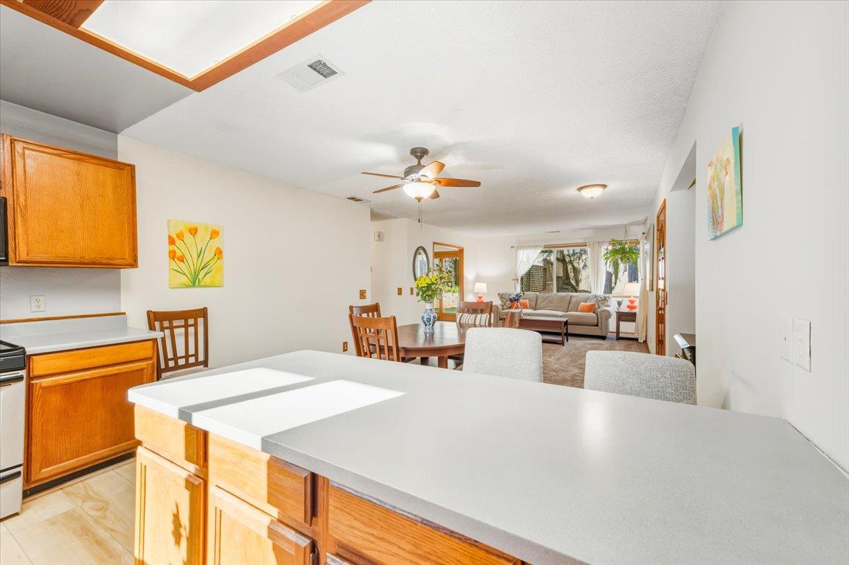 12486 Valley View Road Nevada City, CA 95959 - Photo 16 of 48 a kitchen with a table chairs and a window