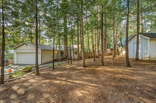 a house with trees in front of it