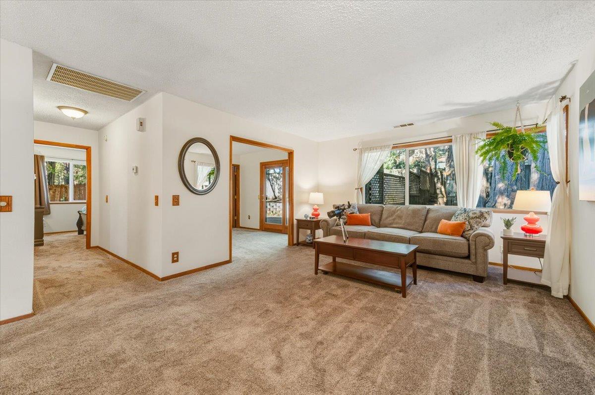 12486 Valley View Road Nevada City, CA 95959 - Photo 3 of 48 a living room with furniture and a large window