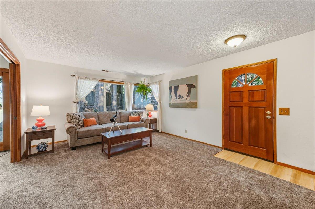 12486 Valley View Road Nevada City, CA 95959 - Photo 5 of 48 a living room with furniture and a window