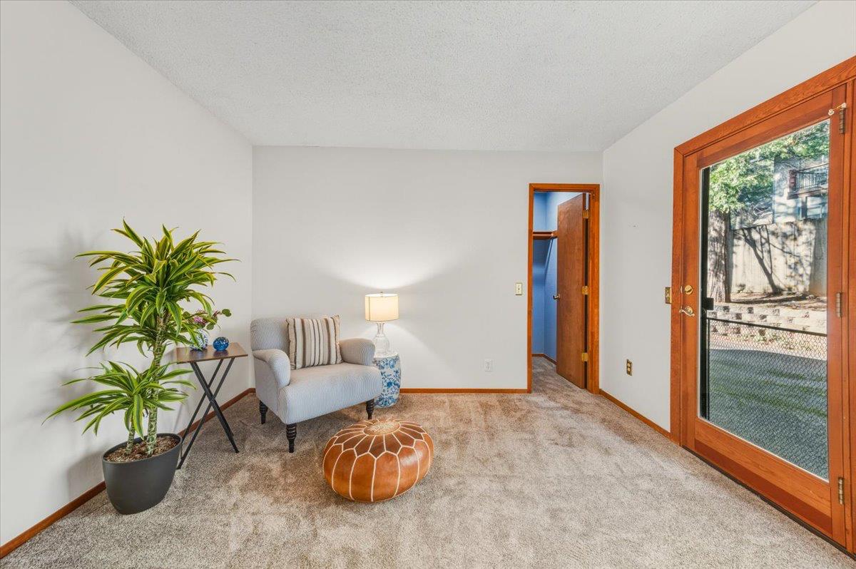 12486 Valley View Road Nevada City, CA 95959 - Photo 6 of 48 a living room with furniture and large windows