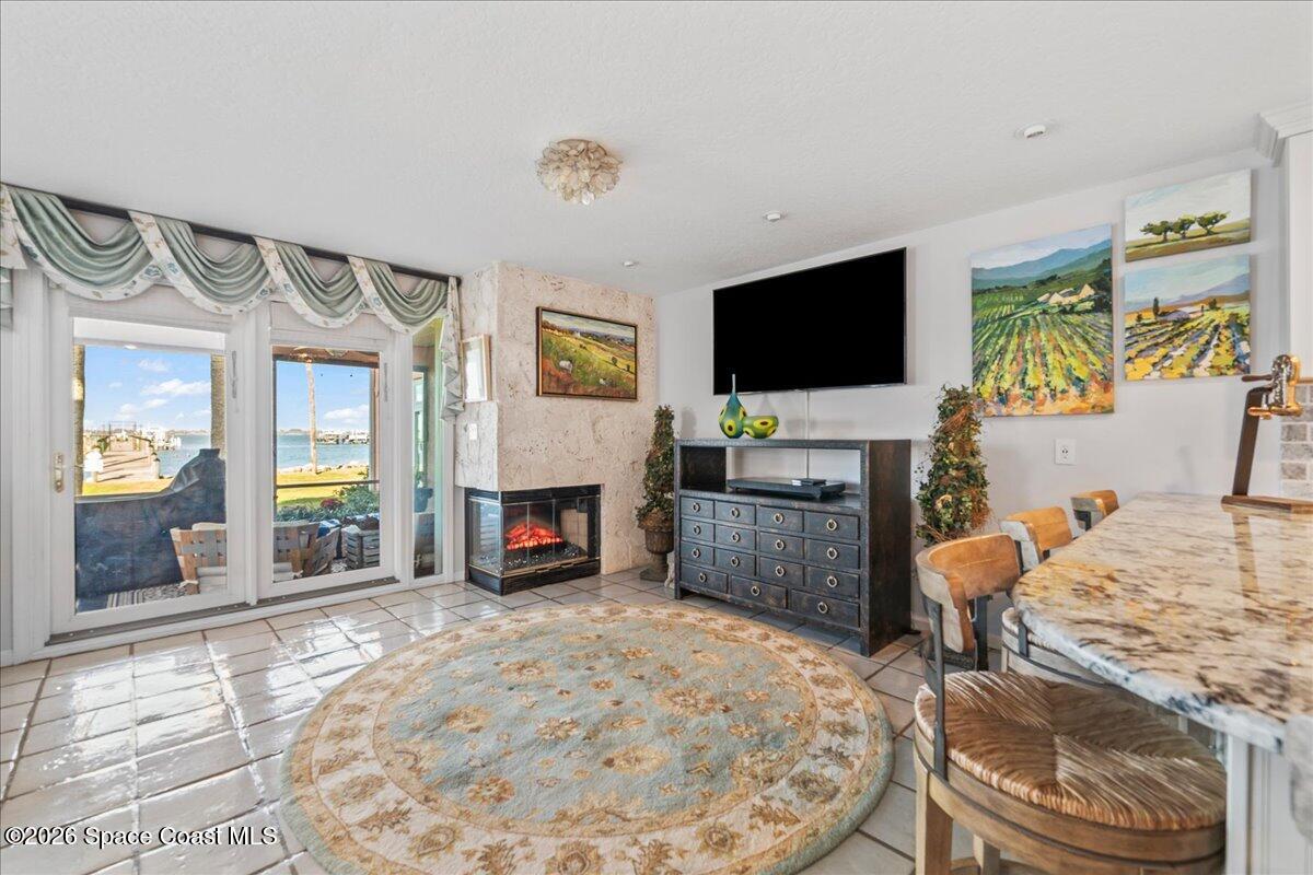 254 Seaview Street, Unit B Melbourne Beach, FL 32951 - Photo 24 of 74 Cozy Ambiance of Electric Fireplace