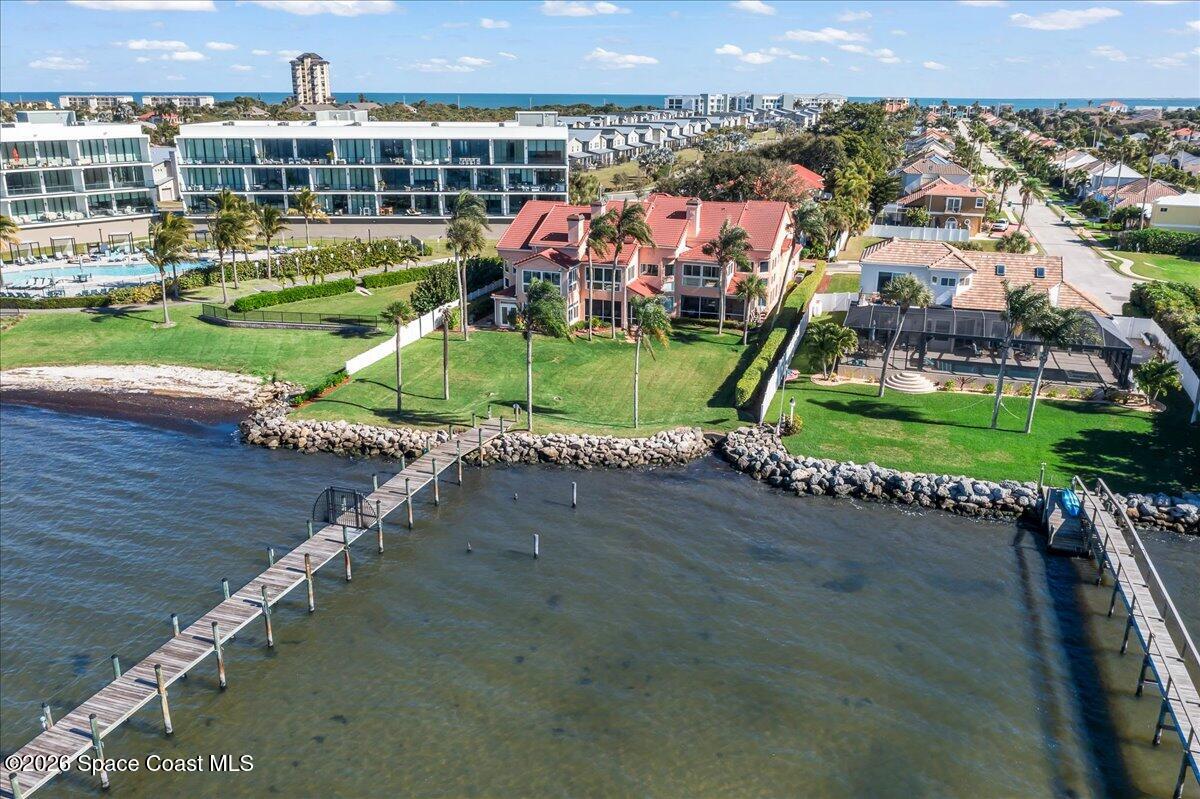 254 Seaview Street, Unit B Melbourne Beach, FL 32951 - Photo 66 of 77 an aerial view of a house with a garden and lake view