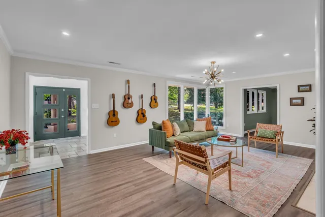 a utility room with sink dryer and washer