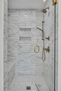 a utility room with sink dryer and washer