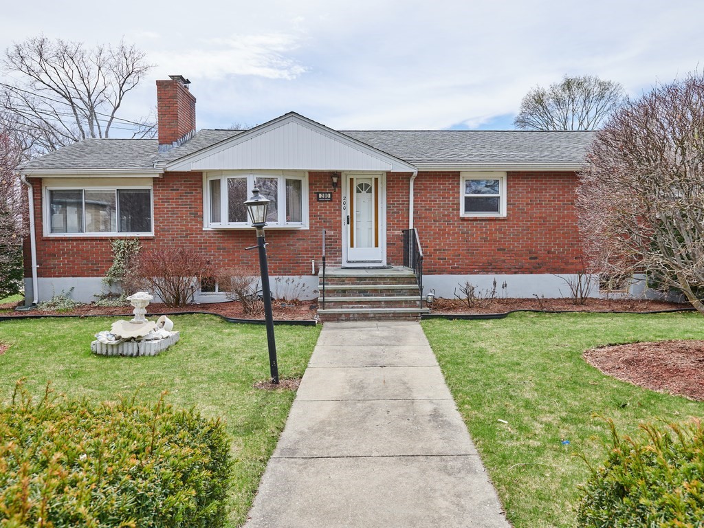 200 Hardy Pond Road Waltham, MA 02451 - Photo 1 of 28 a front view of a house with garden