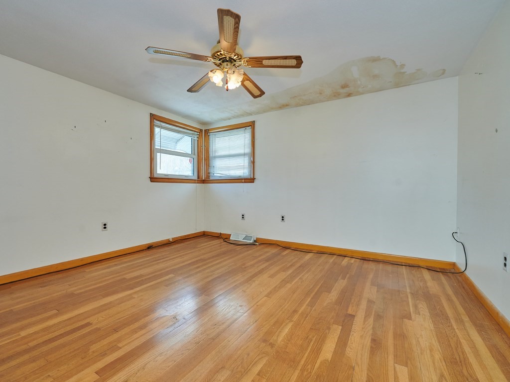 200 Hardy Pond Road Waltham, MA 02451 - Photo 19 of 28 a view of an empty room with wooden floor and a window
