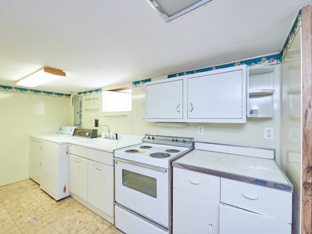 200 Hardy Pond Road Waltham, MA 02451 - Photo 25 of 28 a view of a kitchen with cabinets
