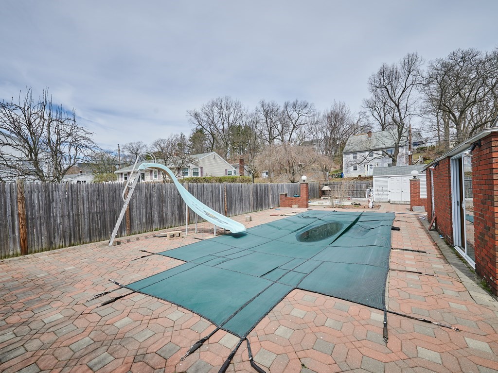 200 Hardy Pond Road Waltham, MA 02451 - Photo 4 of 28 a view of roof deck with a yard and trees