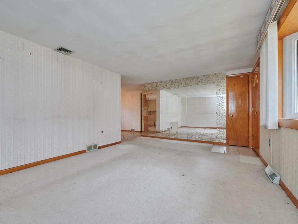 200 Hardy Pond Road Waltham, MA 02451 - Photo 9 of 28 an empty room with windows