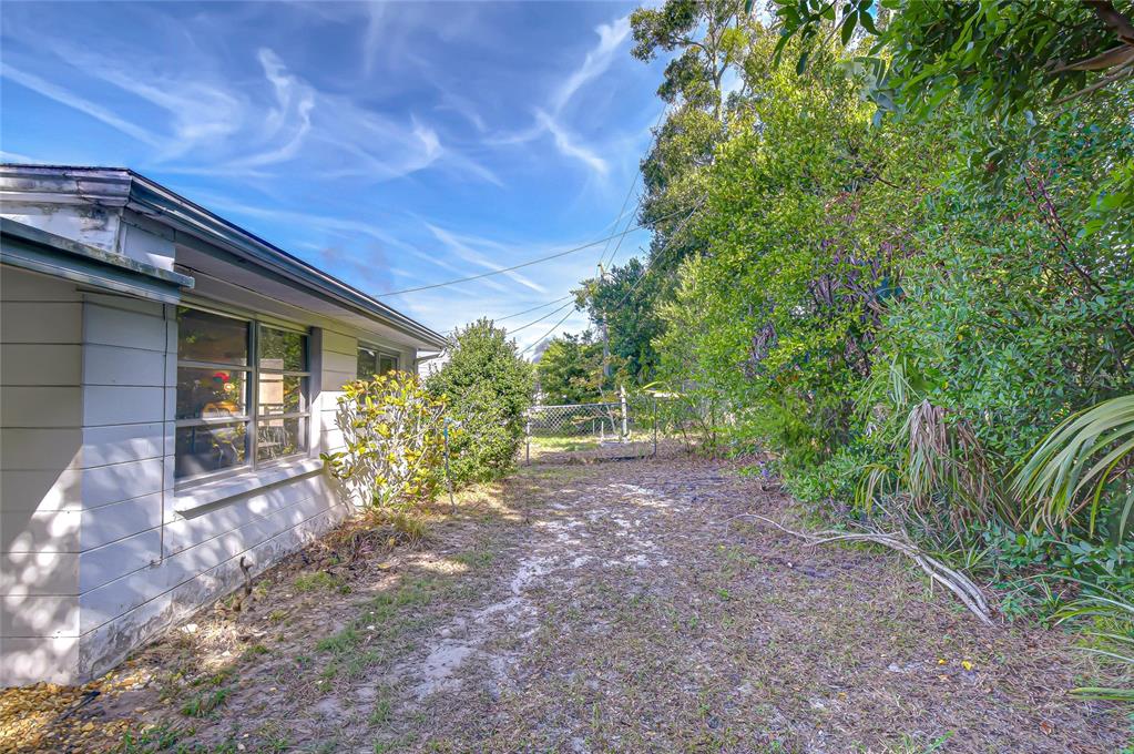 2128 Shannon Drive Holiday, FL 34690 - Photo 20 of 21 a view of a house with a yard