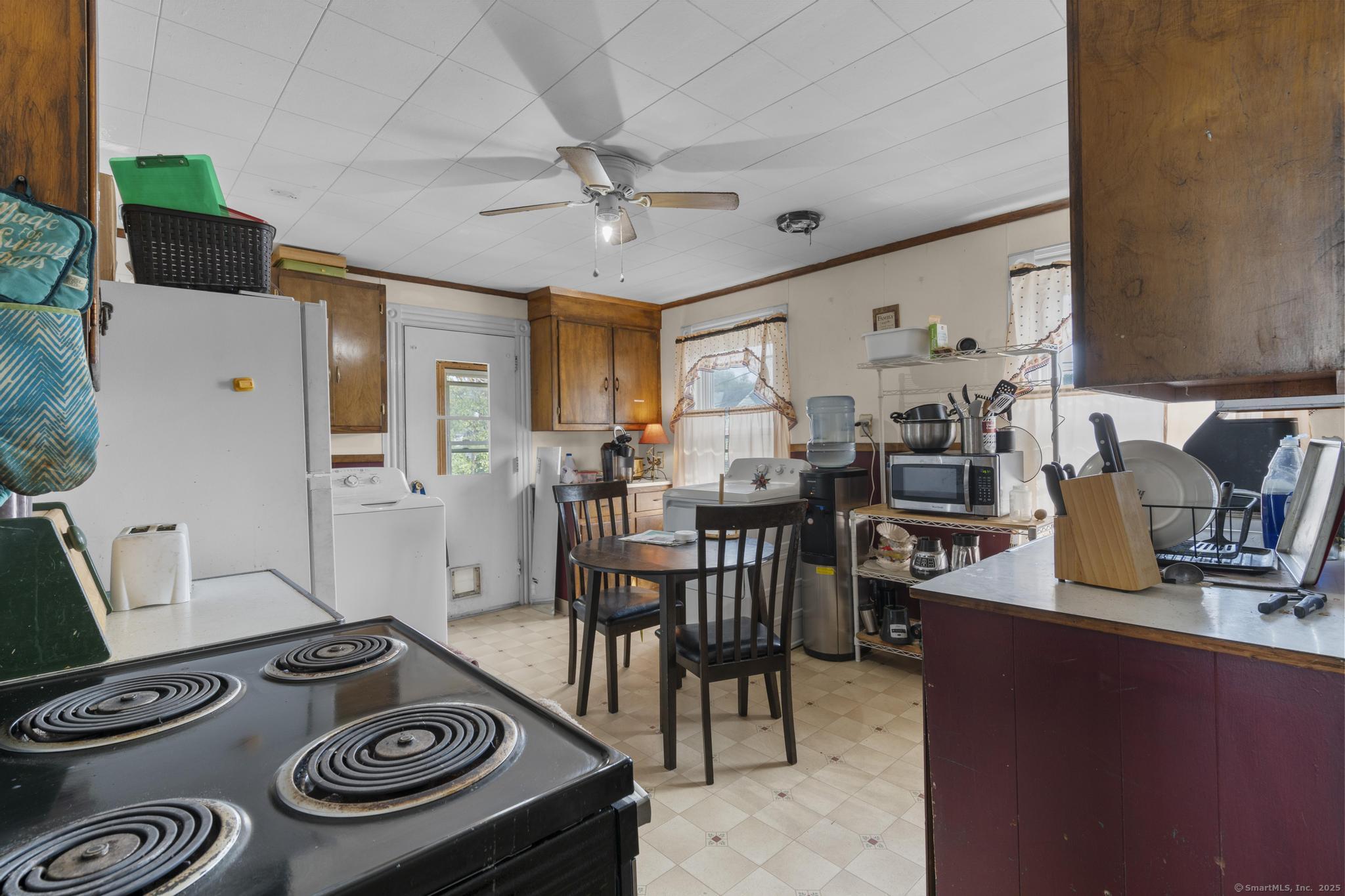 615 South Main Street Torrington, CT 06790 - Photo 10 of 18 a view of a dining room with furniture and a table