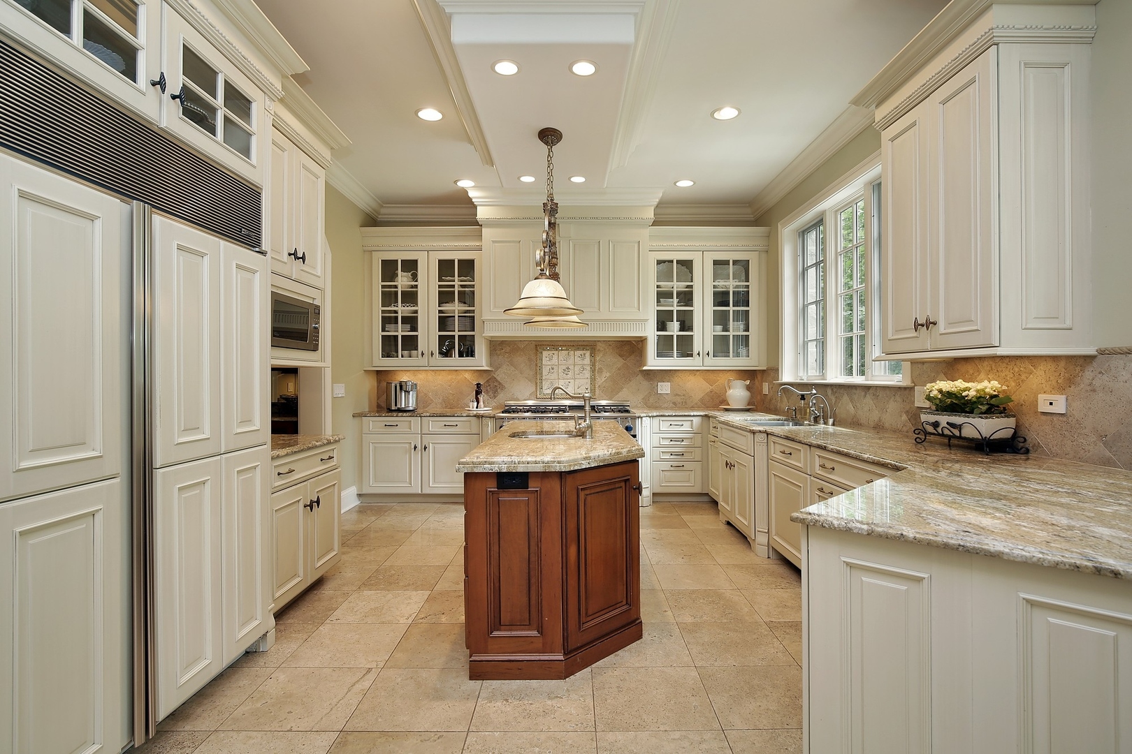 166 Lapier Street Glencoe, IL 60022 - Photo 11 of 32 a large kitchen with stainless steel appliances granite countertop lots of counter top space