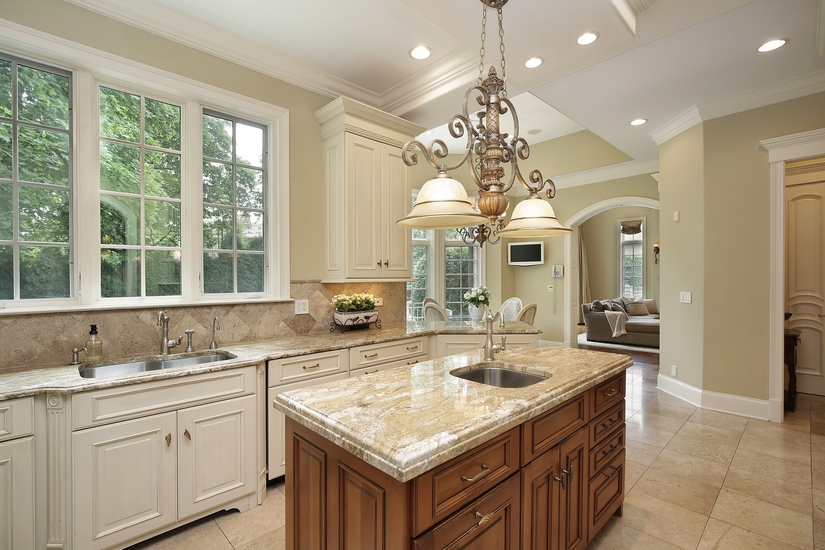 166 Lapier Street Glencoe, IL 60022 - Photo 12 of 32 a kitchen with granite countertop a sink and cabinets